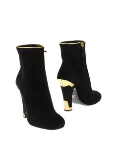 Полусапоги и высокие ботинки Prada