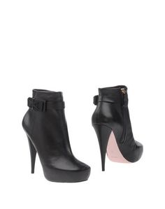 Полусапоги и высокие ботинки Nina Ricci