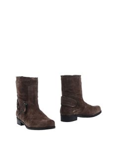 Полусапоги и высокие ботинки Stuart Weitzman