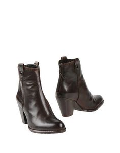 Полусапоги и высокие ботинки Stuart Weitzman