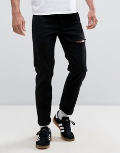 Черные эластичные узкие джинсы с прорехой ASOS - Черный