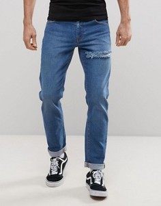 Синие эластичные джинсы слим с прорехой ASOS - Синий