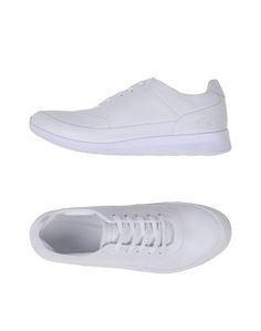 Низкие кеды и кроссовки Lacoste