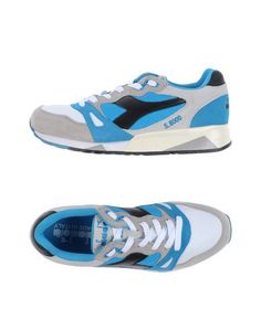 Низкие кеды и кроссовки Diadora