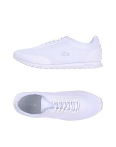 Низкие кеды и кроссовки Lacoste