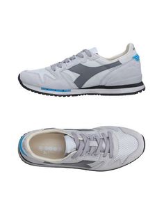 Низкие кеды и кроссовки Diadora