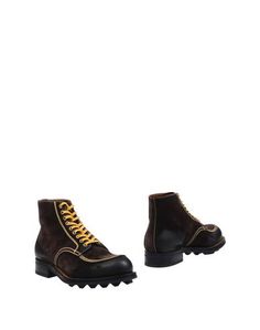 Полусапоги и высокие ботинки Prada