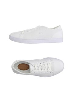 Низкие кеды и кроссовки Lacoste