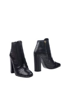 Полусапоги и высокие ботинки Salvatore Ferragamo