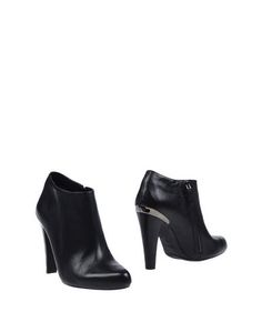 Полусапоги и высокие ботинки Guess