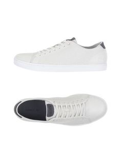 Низкие кеды и кроссовки Lacoste