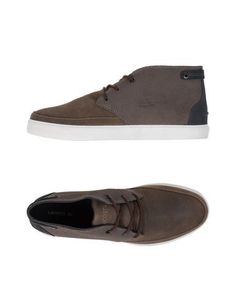 Высокие кеды и кроссовки Lacoste