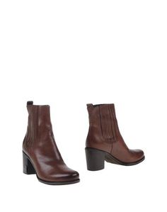 Полусапоги и высокие ботинки Caroll