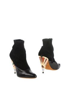 Полусапоги и высокие ботинки Givenchy