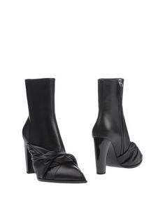 Полусапоги и высокие ботинки Jil Sander