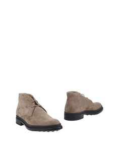 Полусапоги и высокие ботинки Tod`S