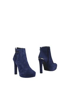 Полусапоги и высокие ботинки Stuart Weitzman