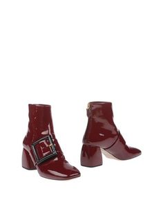Полусапоги и высокие ботинки Miu Miu