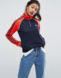 Красно-синяя спортивная куртка с молнией до груди adidas London - Синий