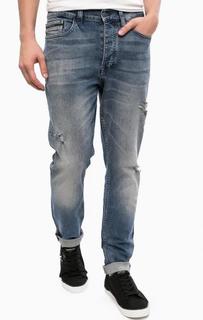 Зауженные джинсы с рваными деталями Calvin Klein Jeans