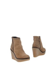 Полусапоги и высокие ботинки Guess
