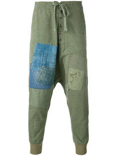 брюки с заниженной проймой и заплатками Greg Lauren