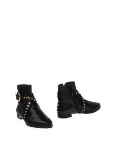 Полусапоги и высокие ботинки Stuart Weitzman