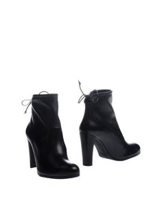 Полусапоги и высокие ботинки Stuart Weitzman