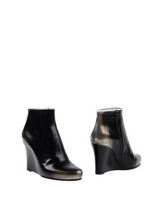 Полусапоги и высокие ботинки Jil Sander