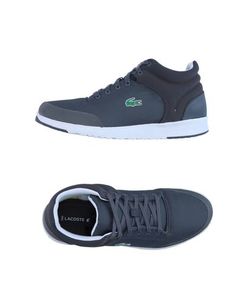 Низкие кеды и кроссовки Lacoste