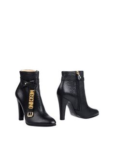 Полусапоги и высокие ботинки Moschino