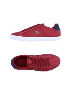 Низкие кеды и кроссовки Lacoste