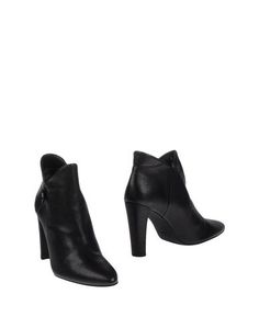 Полусапоги и высокие ботинки Stuart Weitzman