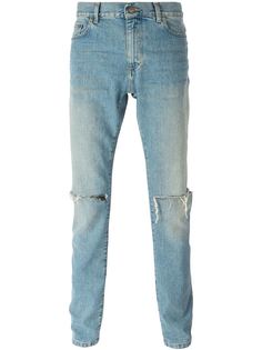 джинсы кроя слим с рваными коленями Saint Laurent