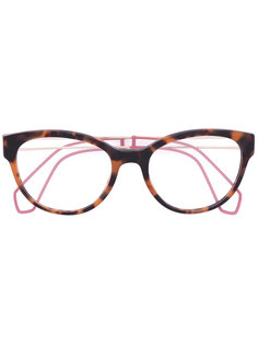 tortoiseshell effect glasses Miu Miu Eyewear