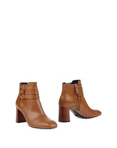 Полусапоги и высокие ботинки Tod`S