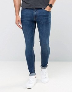 Темные супероблегающие джинсы ASOS - Синий