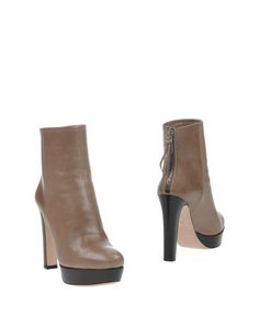Полусапоги и высокие ботинки Miu Miu