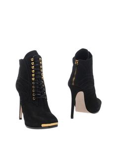 Полусапоги и высокие ботинки Miu Miu