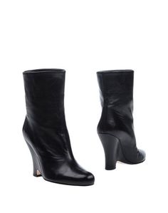 Полусапоги и высокие ботинки Miu Miu