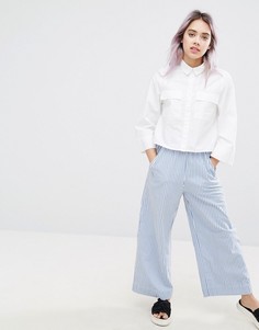 Брюки в полоску Monki - Синий