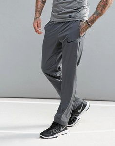 Серые спортивные брюки из ткани Dri-FIT от Nike 800201-021 - Серый