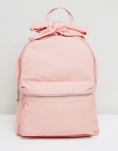 Джинсовый рюкзак с бантиками ASOS - Розовый