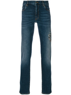 джинсы с вышивкой Roberto Cavalli