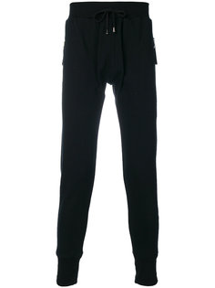 slim fit track pants Unconditional