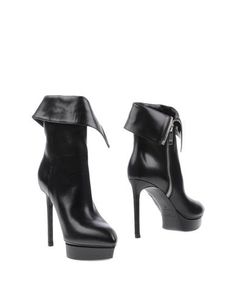 Полусапоги и высокие ботинки Saint Laurent