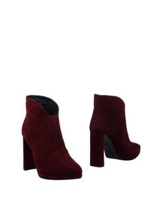 Полусапоги и высокие ботинки Stuart Weitzman