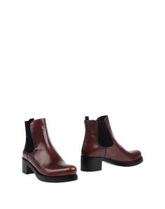 Полусапоги и высокие ботинки Prada