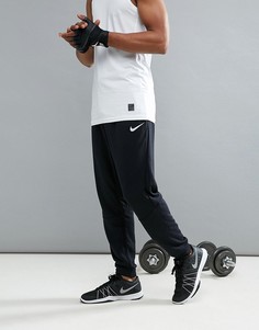 Суженные книзу черные брюки из ткани Dri-FIT от Nike Training 860371-010 - Черный