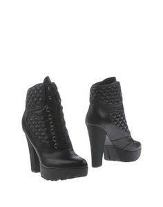 Полусапоги и высокие ботинки Guess